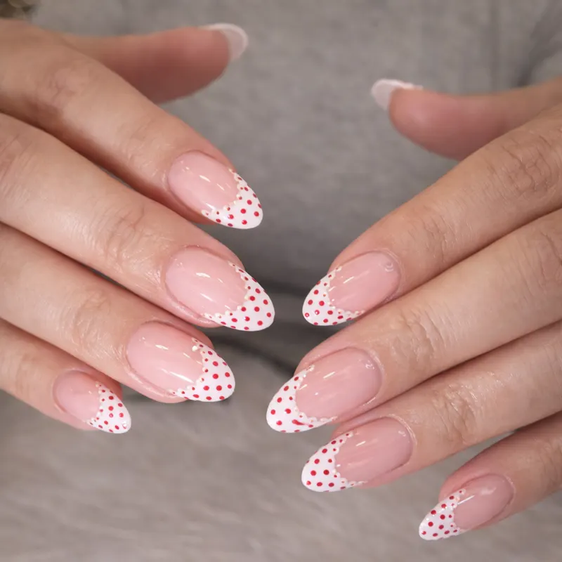 Acrylic, solar nails, nail enhancements, polka dot, French, design by Unlimited Nail Systems in Sugar Land, TX