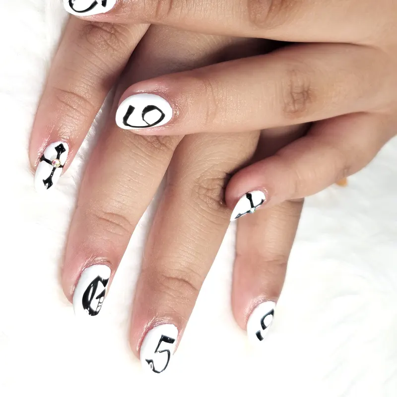 Gel, nail art, graphic design, stone by Unlimited Nail Systems in Sugar Land, TX